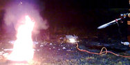 Feuerwehr beim L&ouml;schen eines Brandes