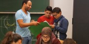 Studierende als LernbegleiterInnen f&uuml;r Kinder und Jugendliche mit Migrationshintergrund
