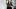 Bild Patricia Cammarata sitzt draußen in urbaner Umgebung und blickt in die Kamera